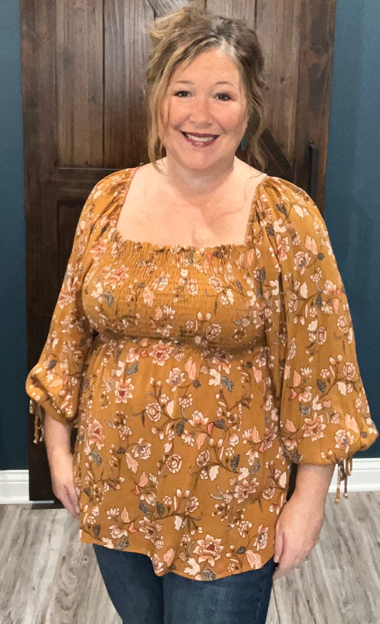 on model Juliette Smocked Top