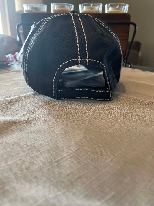 back of black distressed hats