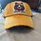 front of yellow distressed hats