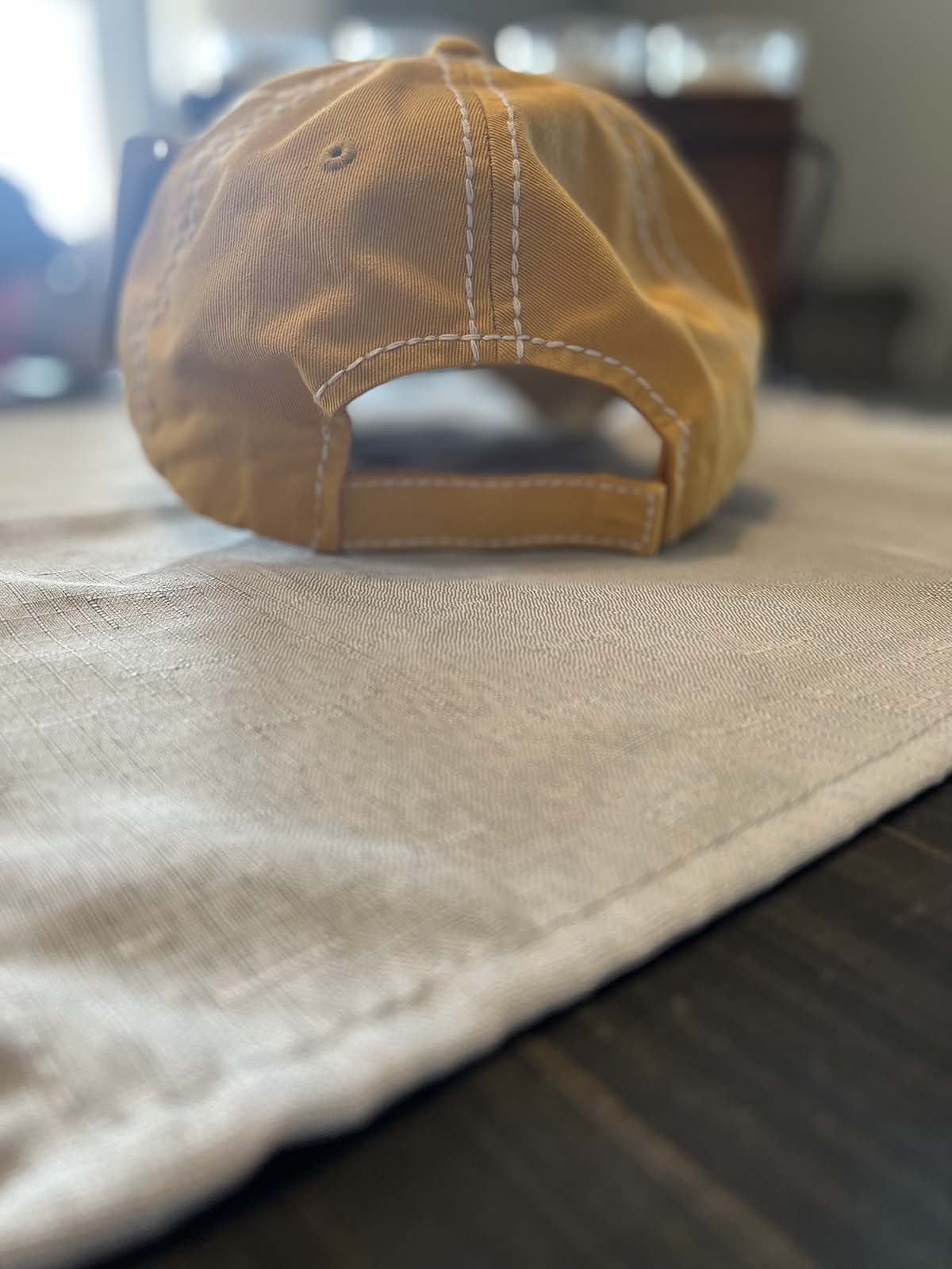 back of yellow distressed hats