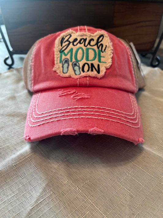front of pink distressed hats