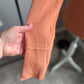 orange waffle knit closeup